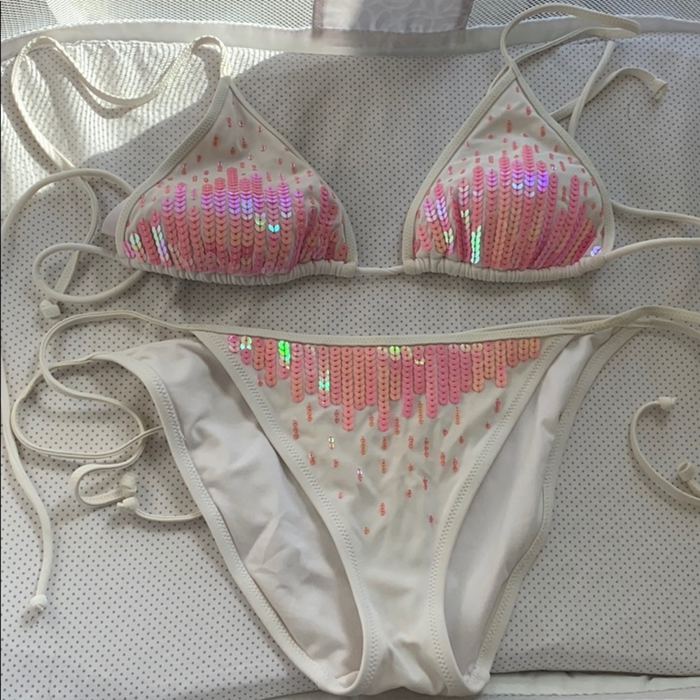 Victoria’s Secret pink sequence and white bikini